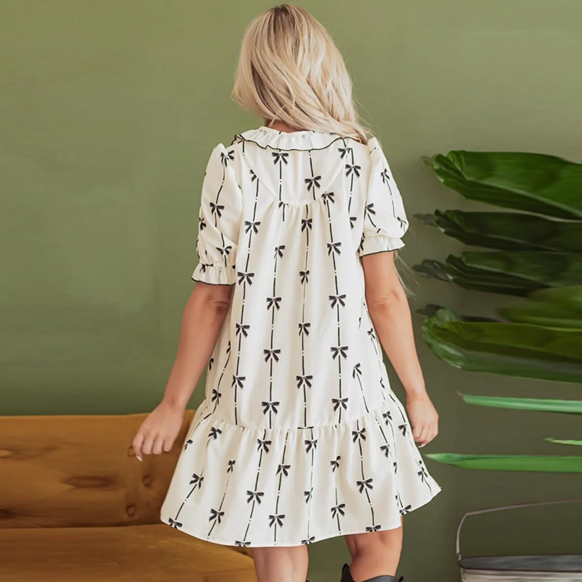Women's Short Sleeve Floral Print Mini Dress, V-Neck Button Front, White with Black Bow Pattern, Ruffle Hem